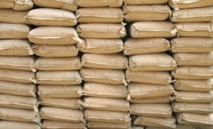 neatly stacked cement bags