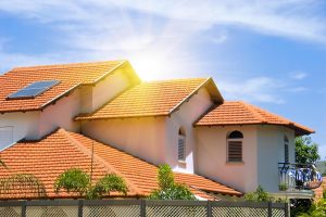 the sun rises over a beautiful tuscan roof